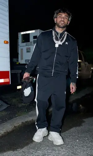 Bryant Mayers wearing Palm Angels pants