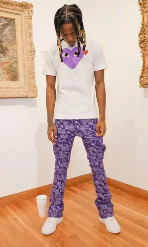 Cae Cartier wearing Valabasas jeans