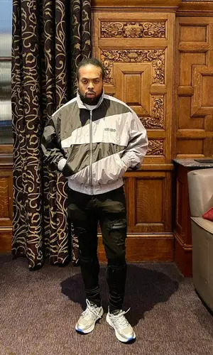 Westside Gunn’s Outfit in Kenzo Jacket, Amiri Jeans & Louis Vuitton Eyewear (2023)