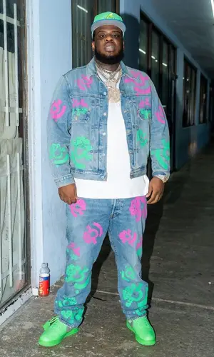 Maxo Kream wearing New Era cap