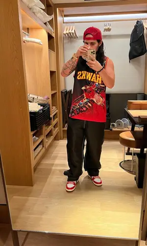 Russ’ Outfit in KidSuper Jersey, Gallery Dept. Hat & Atlanta Hawks (2023)