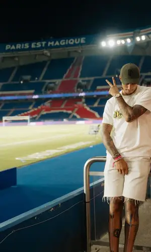 Kyle Kuzma wearing Saint Laurent shorts