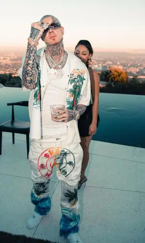 Millyz wearing Rhude shirt