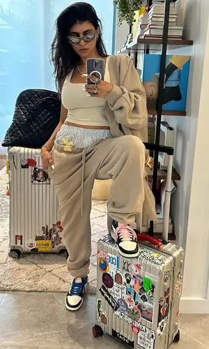 Mia Khalifa’s Outfit in Fear of God Hoodie, Nike Sneakers & Balenciaga Eyewear (2023)
