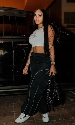 Jania Meshell wearing New Balance sneakers