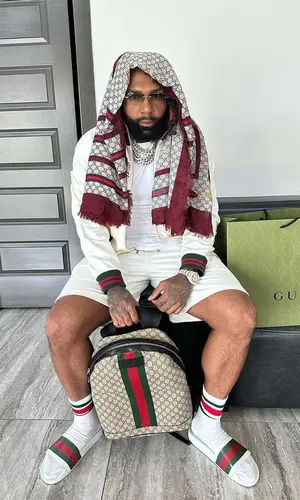 Money Man wearing Gucci shorts