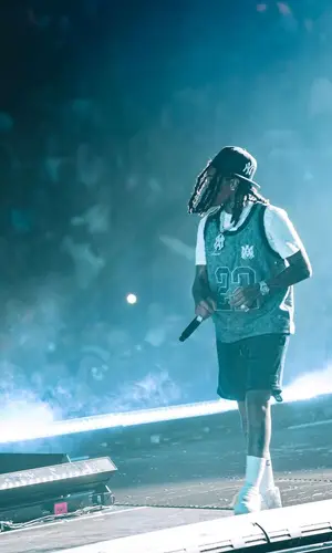 Young M.A’s Outfit in Amiri Jersey, Kith Shorts & New Era Cap (2023)