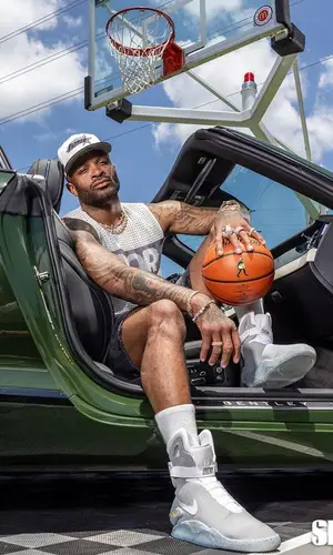 PJ Tucker wearing Dior t-shirt