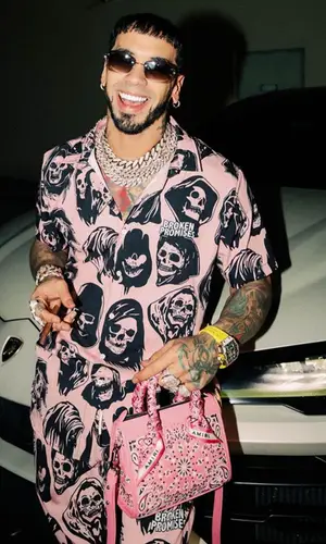 Anuel AA wearing Broken Promises shirt