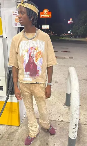 Yung Mal wearing Tulones pants