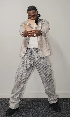Burna Boy wearing Timberland boots