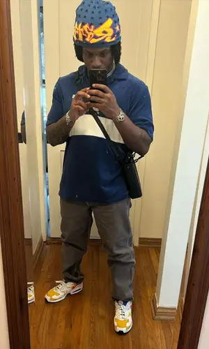 Denzel Curry wearing Stray Rats hat