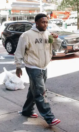 Mustard’s Outfit in Balenciaga Jeans, Nike Sneakers & Wilson Bag (2023)