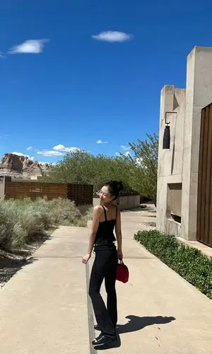 Kim Jennie wearing Comme Des Garcons bag