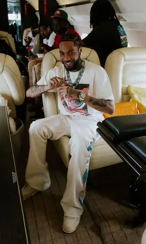 Key Glock wearing Goyard bag
