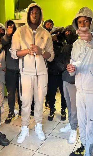 Abra Cadabra wearing Nike pants