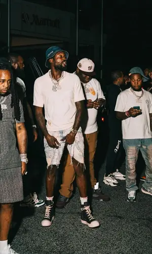 Chino Braxton wearing Louis Vuitton cap
