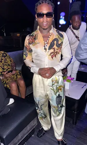 Jacquees wearing Saint Laurent sandal