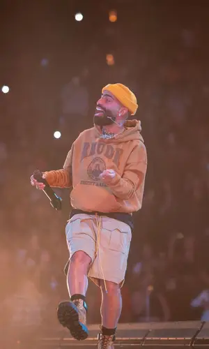 Arcangel wearing Rhude hoody