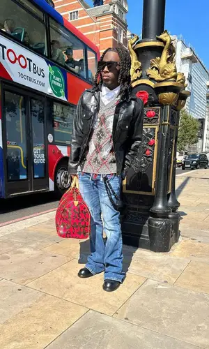 Kai Cenat wearing Louis Vuitton bag