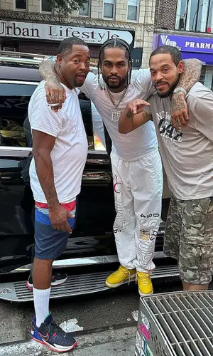 Dave East wearing Supreme pants