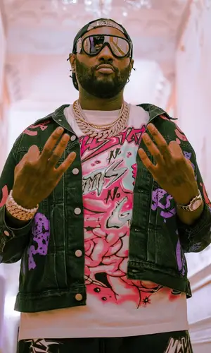 Peezy wearing Loewe eyewear