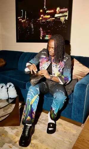 Fireboy DML wearing Casablanca jacket