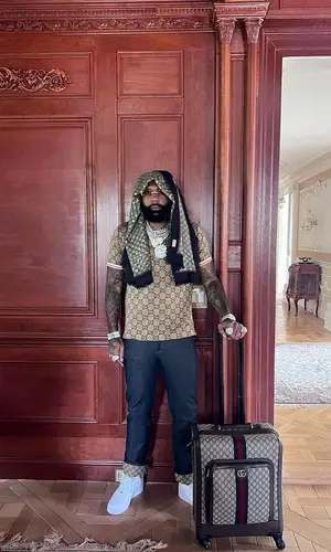 Money Man wearing Gucci shirt