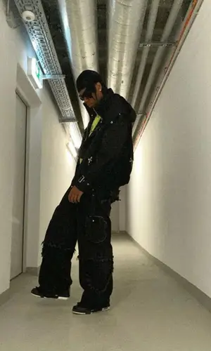 Sidney Friede wearing Berk Studios pants