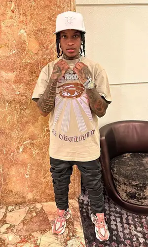 Lil Perfect’s Outfit in Guapi Pants, New Balance Sneakers & New Era Cap (2023)