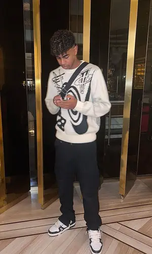 Lamine Yamal wearing Louis Vuitton sneakers