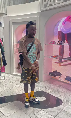 Marty Mula wearing Burberry sneakers