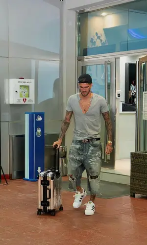 Rodrigo De Paul wearing Adidas sneakers