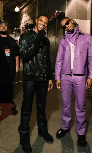 A Boogie Wit Da Hoodie wearing Chrome Hearts glov