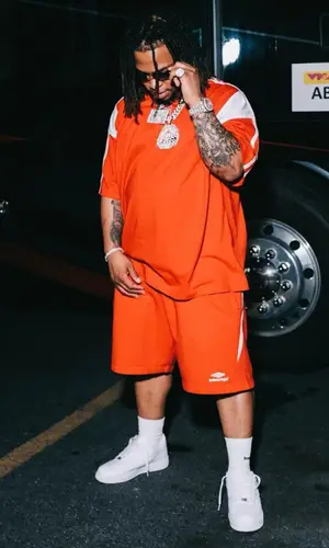 Don Q’s Outfit in Balenciaga T-Shirt, Nike Sneakers & Cartier Eyewear (2023)
