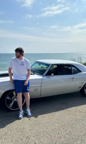 Murda Beatz’s Outfit in Gallery Dept. T-Shirt, Nike Sneakers & Goyard Bag (2023)