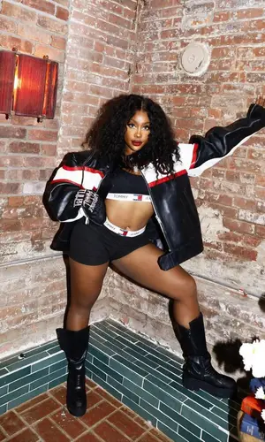 SZA wearing Tommy Hilfiger jacket
