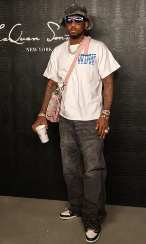 Fabolous wearing Who Decides War bag