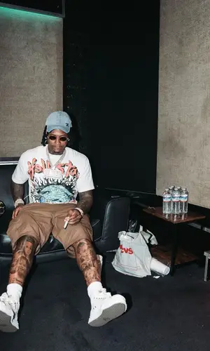 Moneybagg Yo wearing Hellstar t-shirt
