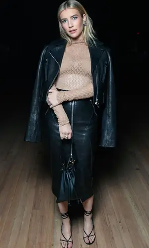 Emma Roberts wearing Khaite jacket