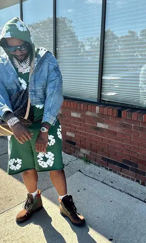 Peezy wearing Timberland boots