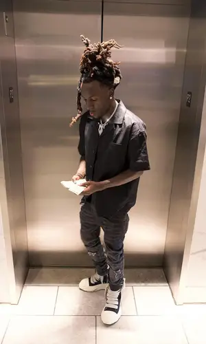 Marty Mula wearing Off-White jeans