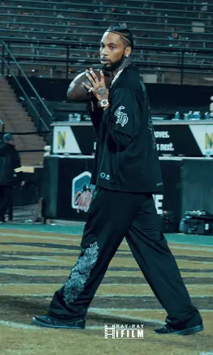 Key Glock wearing Chrome Hearts pants