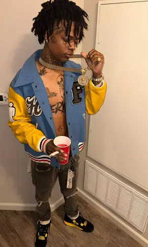 Heembeezy wearing Homme + Femme jacket