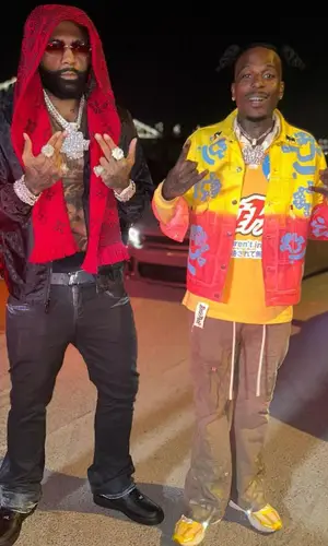 Money Man wearing Louis Vuitton scarf