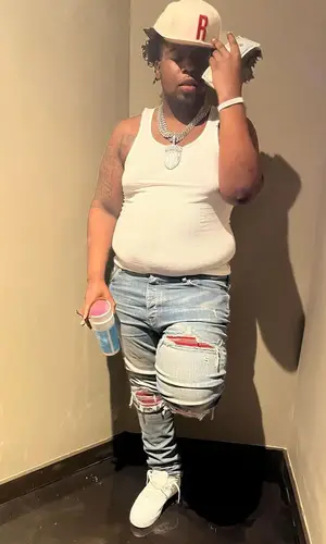 Big 30 wearing Hanes top