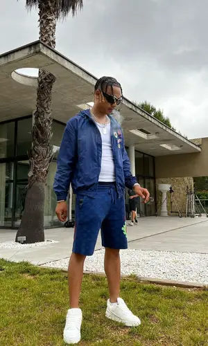 Oboy wearing Louis Vuitton sneakers