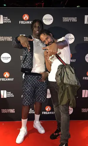 Abra Cadabra wearing Louis Vuitton jacket