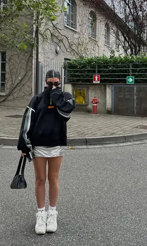 Dixie D'Amelio wearing GCDS sneakers