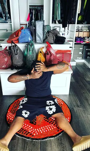 Peezy wearing Adidas other